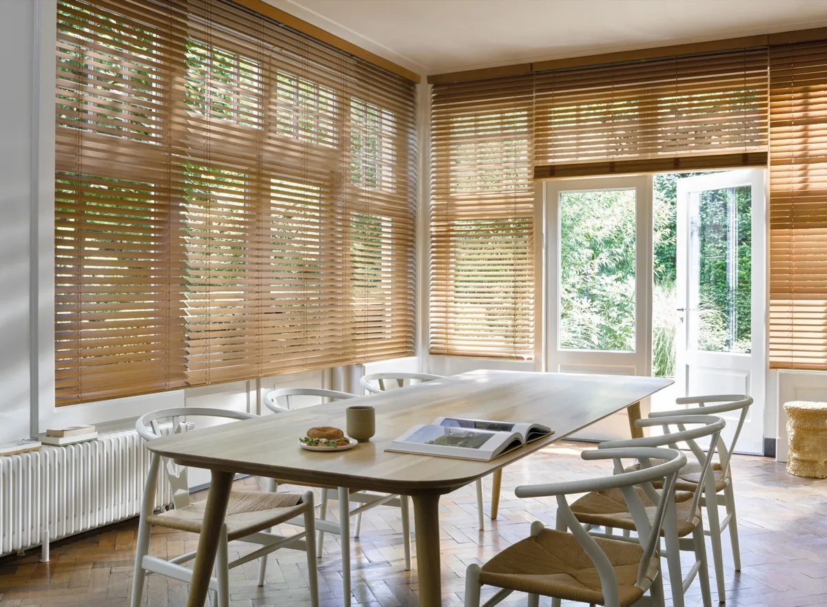Interior of The Scottish Shutter Company Design Studio showing full size shutter and blind displays