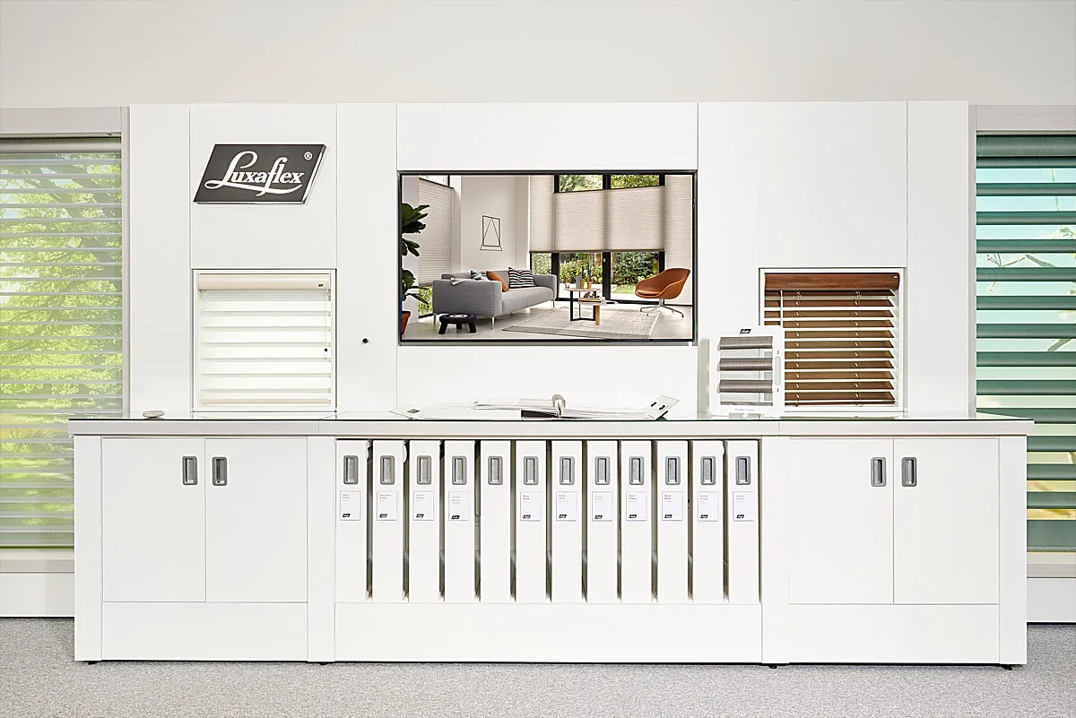 Luxaflex display wall with screen and sample books at the Edinburgh Design Studio