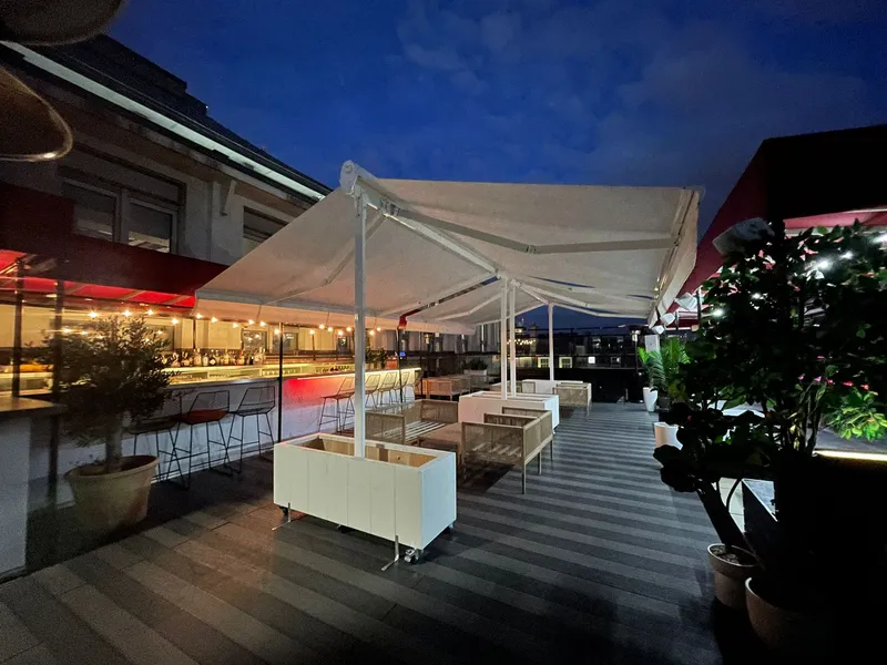 Large butterfly awning installation