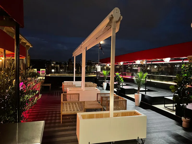 Freestanding butterfly awning on patio