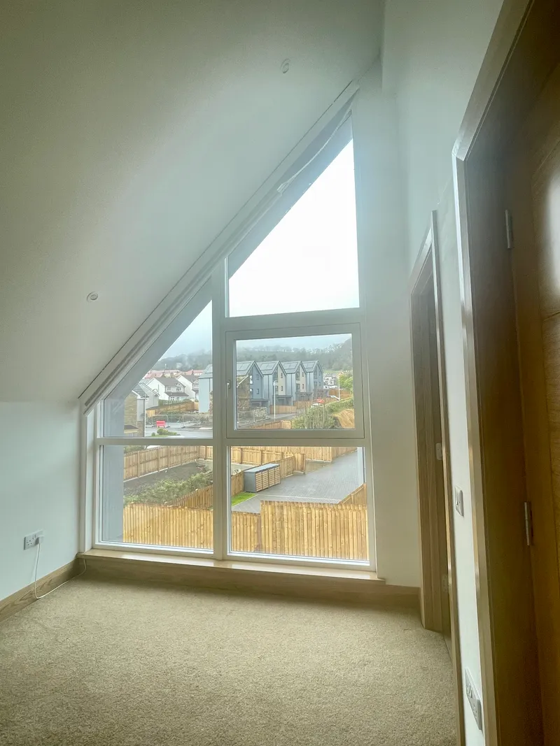 Motorised, Shaped Gable Duette Blind Fully Retracted