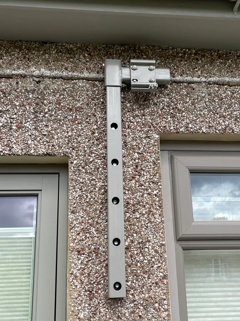 Garden awning extending over decking area