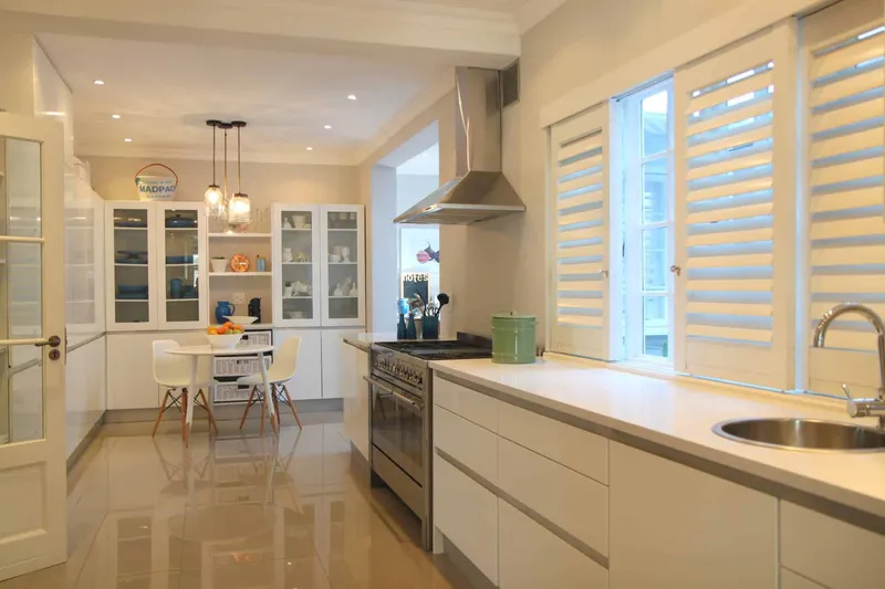 ByPass Aluminium Security Shutters  with 89mm louvres and finished in Satin White