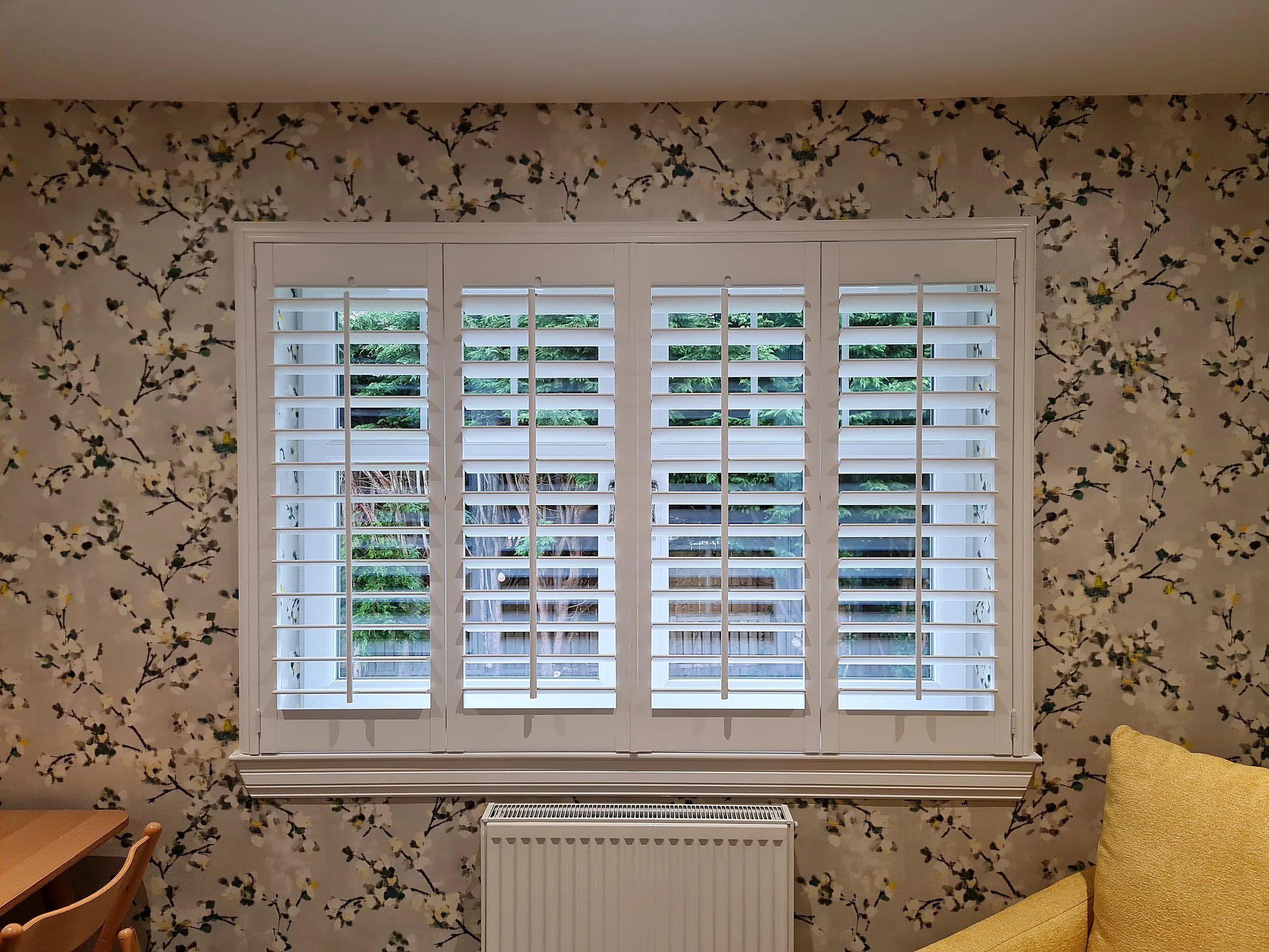 Bi-fold shutters on patio doors