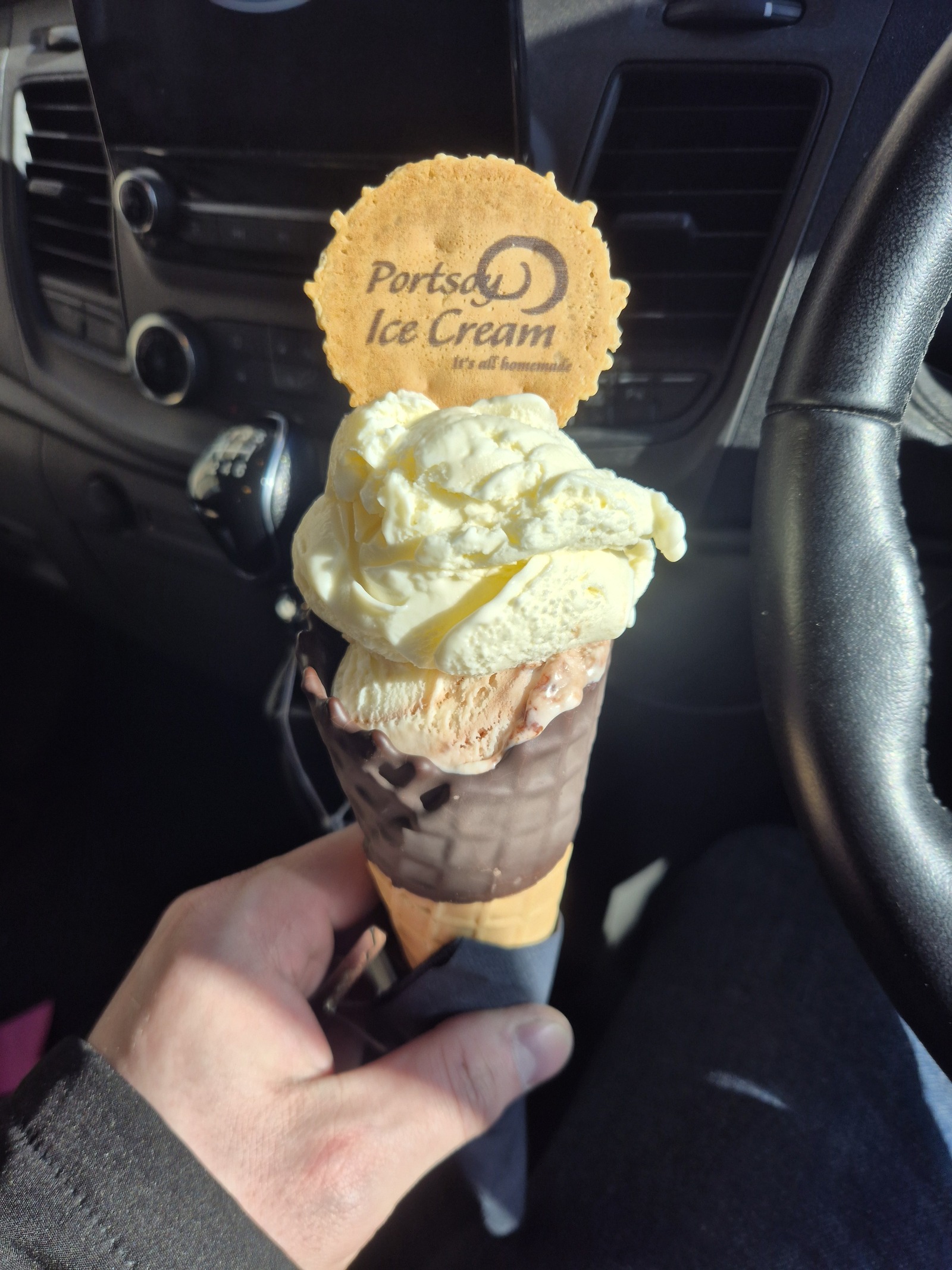 Leon enjoying a Portsoy Ice Cream cone during a lunchbreak on the road