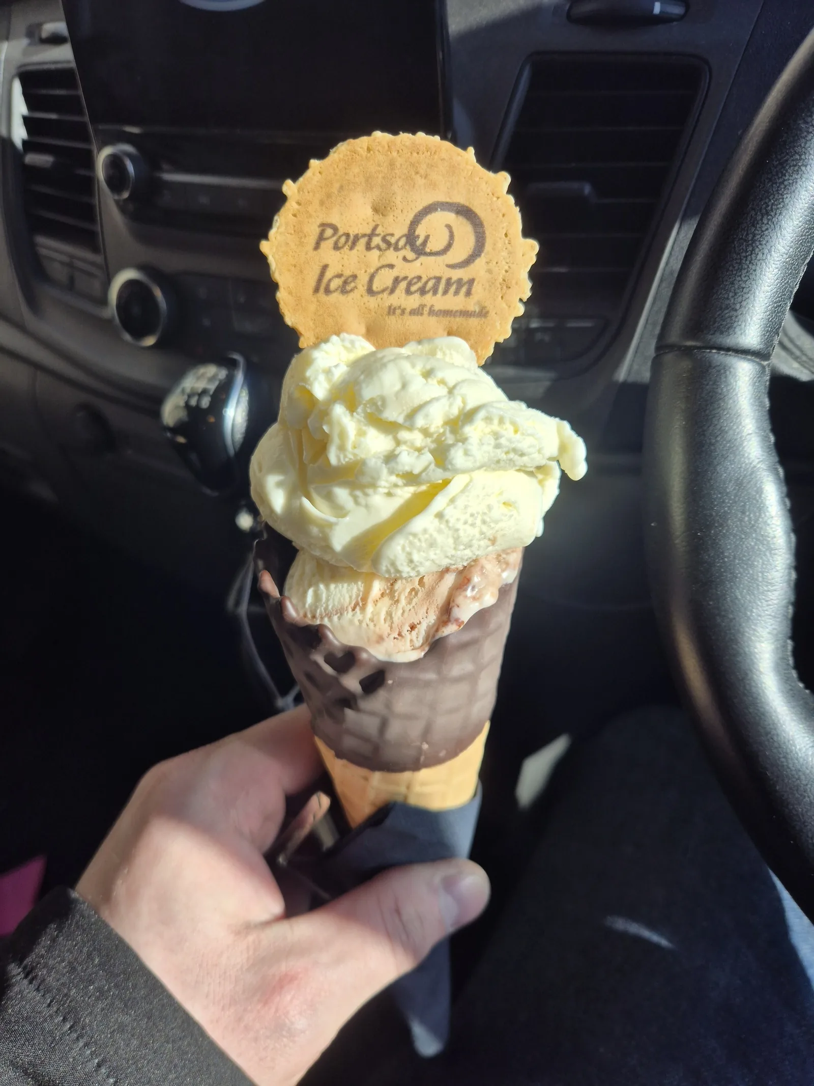 Leon enjoying a Portsoy Ice Cream cone during a lunchbreak on the road