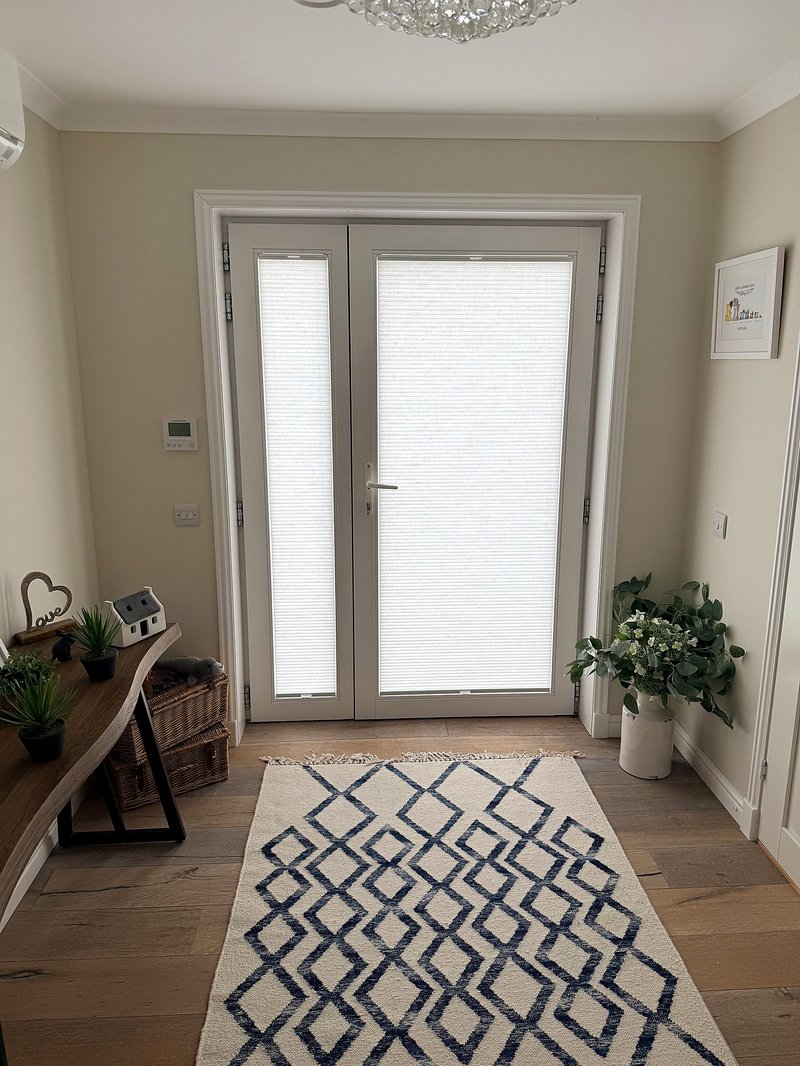 TruFit blinds on French doors in a hallway